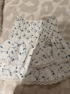 The Reset White Floral Tiered Mini Skirt with Blue Embroidery